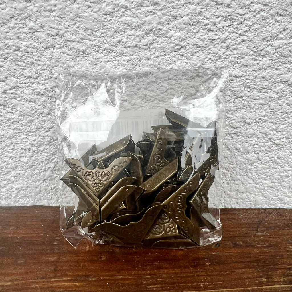 Coin de livre décoratif et protecteur